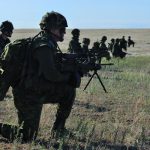 Infantry soldiers from The Canadian Scottish Regiment (Princess Mary’s), from Victoria British-Columbia, line-up during a platoon attack in the Orchard Combat Training Center in Boise Idaho during Exercise Cougar Salvo.