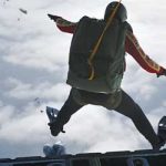 Cpl Philippe Morin feels the wind pushing up on his flippers as he jumps out of a  Hercules aircraft near CFB Esquimalt during Exercise Trident Fury 13.