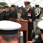 LCdr Blair Brown, the new Commanding Officer of Her HMCS Edmonton, addresses the ship's company and guests during the Change of Command Ceremony on board the ship.