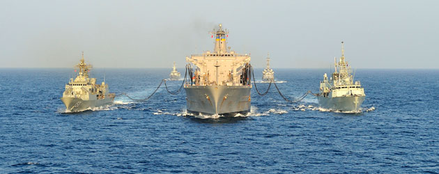 HMCS Regina (right) along with HMAS Anzac (left) conduct a replenishment at sea with USNS Patuxent (centre) in the Gulf of Aden during Operation Artemis. HMCS Regina and HMAS Anzac conduct a replenishment at sea