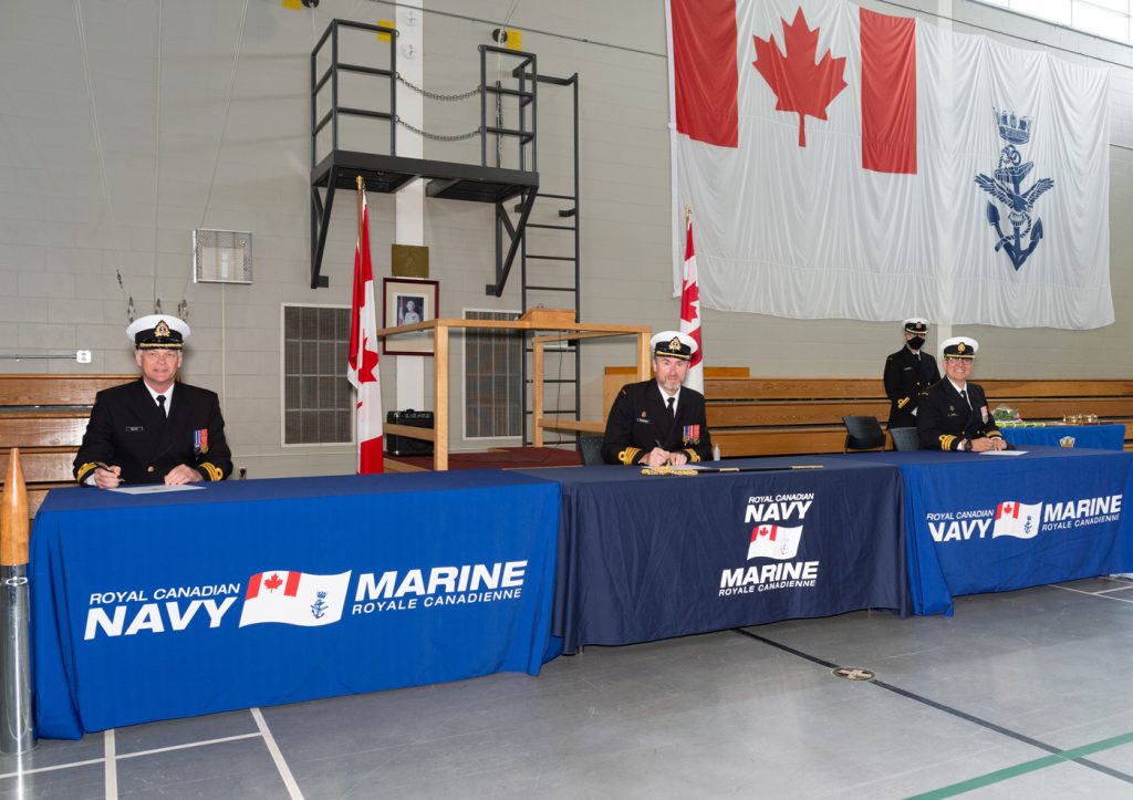 From left to right: Commander (Cdr) Cameron Miller