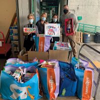 Base golfers donate toys to sick kids