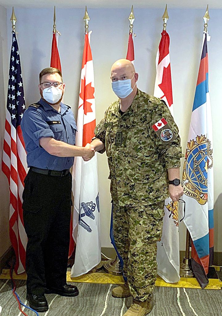 Sailor First Class Jeramie Welsh was presented with a Commander Canadian Joint Operations Command Coin for Excellence during deployment on RIMPAC 22 in Honolulu