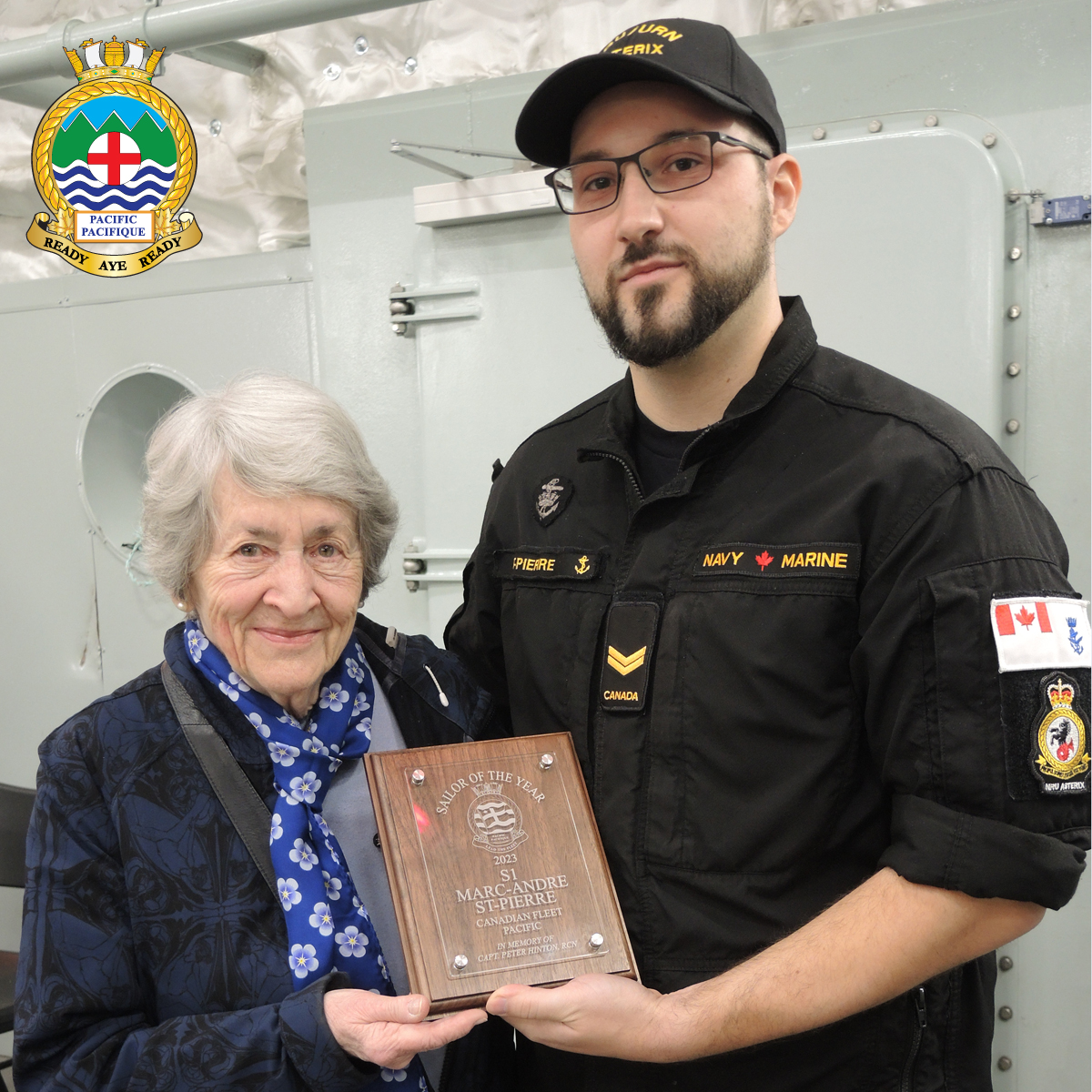 Sailor 1st Class Marc-Andre St-Pierre of NRU Asterix receives the Sailor of the Year Award for 2023 from Mrs. Geraldine Hinton during a ceremony aboard the vessel on Feb 22. Photo: Peter Mallett / Lookout
