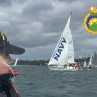 Sailor 3rd Class Isabelle Maguet of HMCS Malahat keeps a close eye on the 135 boats at the start line of the 79th Swiftsure Yacht Race, including the Royal Canadian Navy training vessel Goldcrest, centre, off Clover Point on May 25. Photo: Lieutenant (Navy) Donald Den.