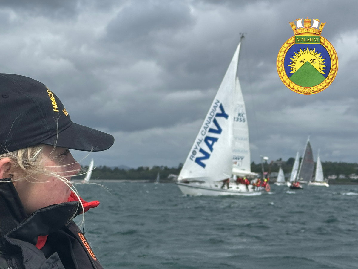 Sailor 3rd Class Isabelle Maguet of HMCS Malahat keeps a close eye on the 135 boats at the start line of the 79th Swiftsure Yacht Race, including the Royal Canadian Navy training vessel Goldcrest, centre, off Clover Point on May 25. Photo: Lieutenant (Navy) Donald Den.
