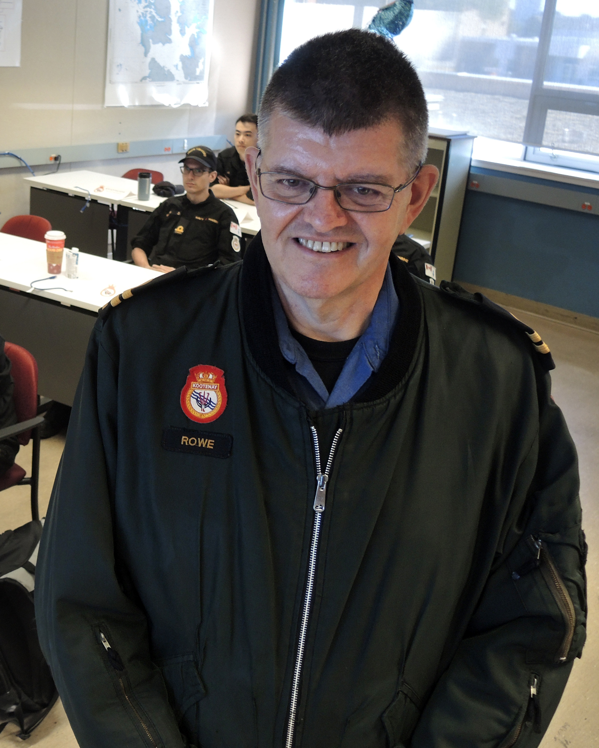 HMCS Venture Instructor Lt(N) Richard Rowe proudly shows off his Bridge Watchkeepers Jacket during his NWO III Kootenay class at Workpoint, July 8. Photo: Peter Mallett/Lookout Newspaper