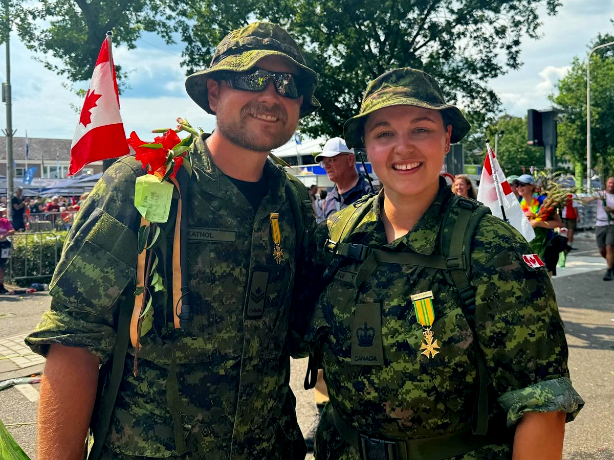 Master Sailor (MS) Mitchel Kathol, Boatswain, and Petty Officer 1st Class (PO1) Amie-Anne Savage, Human Resource Advisor posing with their Vierdaagsekruis medals at the end of the Via Gladiola Parade Nijmegen, Netherlands, on July 19. Photo supplied