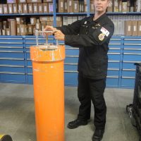 Chief Petty Officer 2nd Class (CPO2) Nelson Harvey, National Submarine Search and Rescue Coordinator displays CANSUBFOR PODs. Photo supplied.