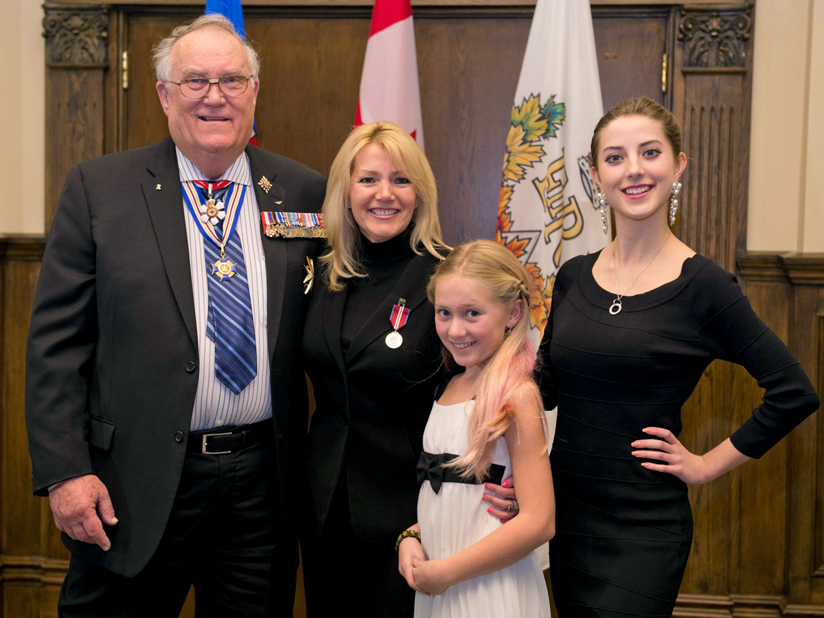 The Byrnell family while being awarded the Queen Elizabeth II Diamond Jubilee Award.