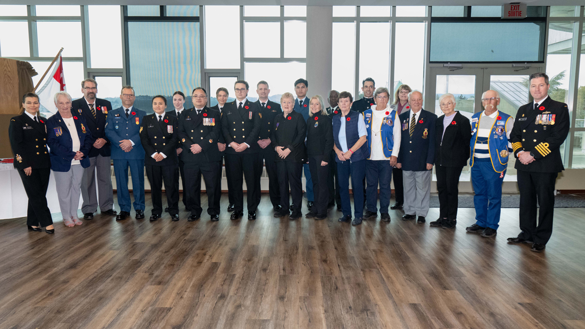 The first poppy pinning ceremony held at the Chief & Petty Officers' Mess, Canadian Forces Base Esquimalt on Oct. 25. Photo: Sailor 1st Class Brendan McLoughlin