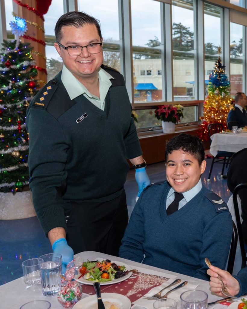 Captain Simpson serves Corporal Lacadin as the salads come out for all of the junior members. Photos: Master Warrant Officer Samantha Crowe