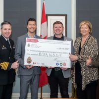 (Left-Right) Chief Petty 0fficer 1st Class Sue Frisby, Base Chief Petty Officer, Captain (Navy) Kevin Whiteside, CFB Esquimalt Base Commander, Matt Carlson, NDWCC Team Leader, Mark Crocker, United Way of Southern Vancouver Island, British Columbia, Barbara Toller, HealthPartners, and Ivan Freire, Senior Donor Relations Officer, stand with a cheque representing the $137,165.53 raised during the 2024 National Defence Workplace Charitable Campaign, on Feb. 18. Photo: Master Sailor Bryan Underwood, MARPAC Imaging Services