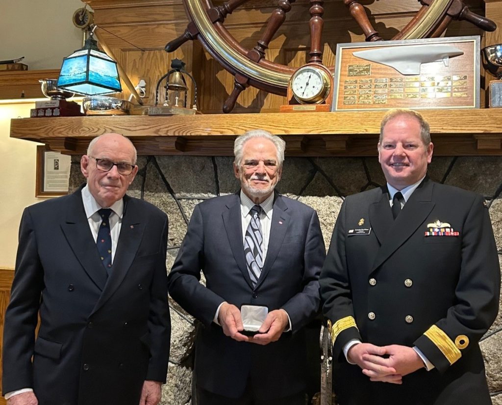 Vice-Admiral (retired) Nigel Brodeur (left) and Commodore David Mazur, Commander Canadian Fleet Pacific (right) alongside Robert Allan, 2024 recipient of the Admiral’s Medal at the Royal Victoria Yacht Club. Vice-Admiral (retired) Nigel Brodeur (left) and Commodore David Mazur, Commander Canadian Fleet Pacific (right) alongside Robert Allan, 2024 recipient of the Admiral’s Medal at the Royal Victoria Yacht Club.