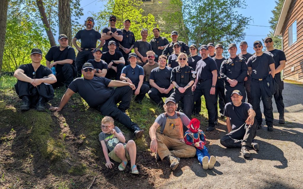 Members of HMCS Max Bernays pose for a photo alongside
volunteers and children at Easter Seals Camp Shawnigan on May 1. Photo supplied.