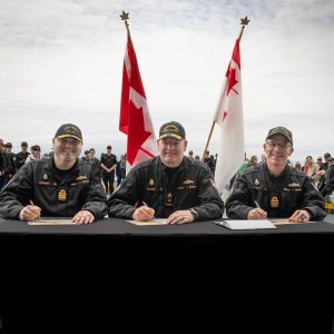HMCS Regina Observes  Change of Command at Sea  with Sailors and Families Aboard