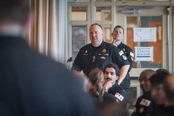 Rear-Admiral David Patchell (front) and Chief Petty Officer 1st Class (CP01) Jonathon Sorensen (back), listen to a sailor’s question during a Nov 19 town hall at Canadian Forces Base (CFB) Esquimalt. Photo: Master
Sailor (MS) Bryan Underwood, MARPAC Imaging