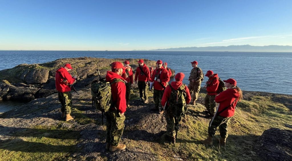 Canadian Ranger Basic Military Indoctrination (CRBMI) candidates working through a navigation exercise together as part of the CRBMI course curriculum. Photo: Canadian Ranger Master Corporal (MCpl) Joline Couture