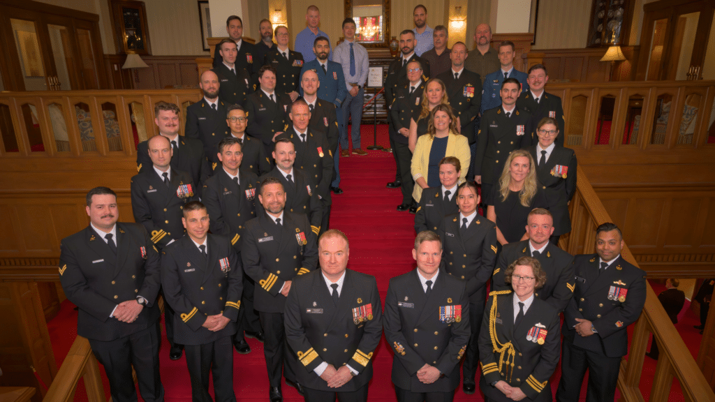 Award recipients stand with members of MARPAC Command (at front) during the April 15 Honours and Recognition ceremony. Photo: S1 Jordan Schilstra, MARPAC Imaging