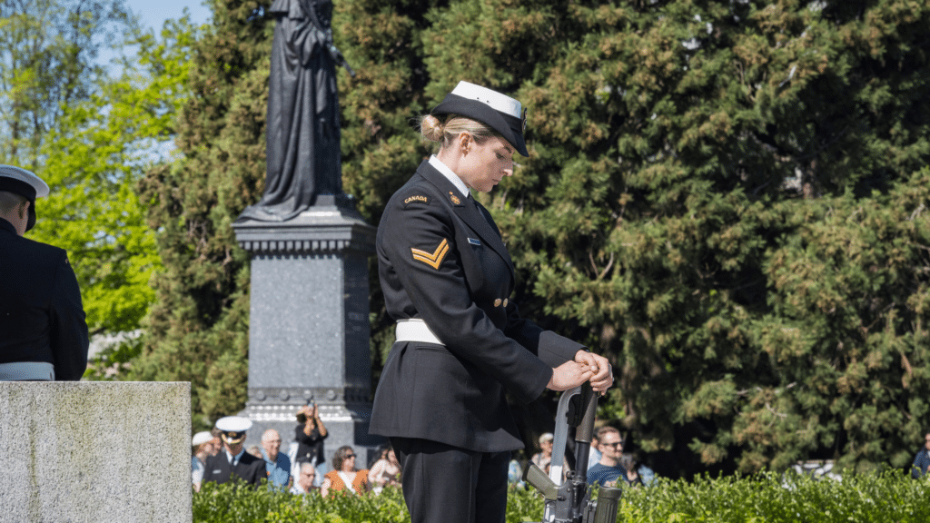 A member of the RCN stands in silence during the May 3 Battle of the Atlantic Ceremony. Photo: MS Bryan Underwood, MARPAC Imaging