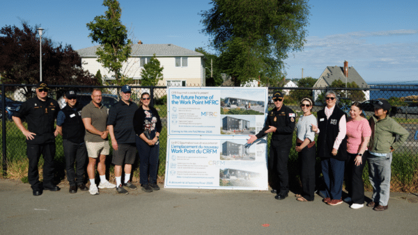 Official signage for the Work Point MFRC location is revealed. Photo: Geoff Howe