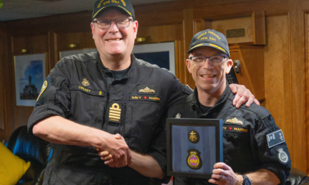 Cdr Sleen Presented With Gold SSI at Sea